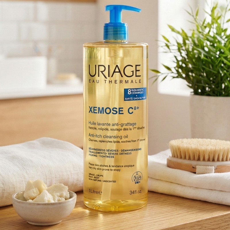Flacone con dosatore dell'olio detergente Uriage Xemose Huile Lavante nel formato da 1 litro.
